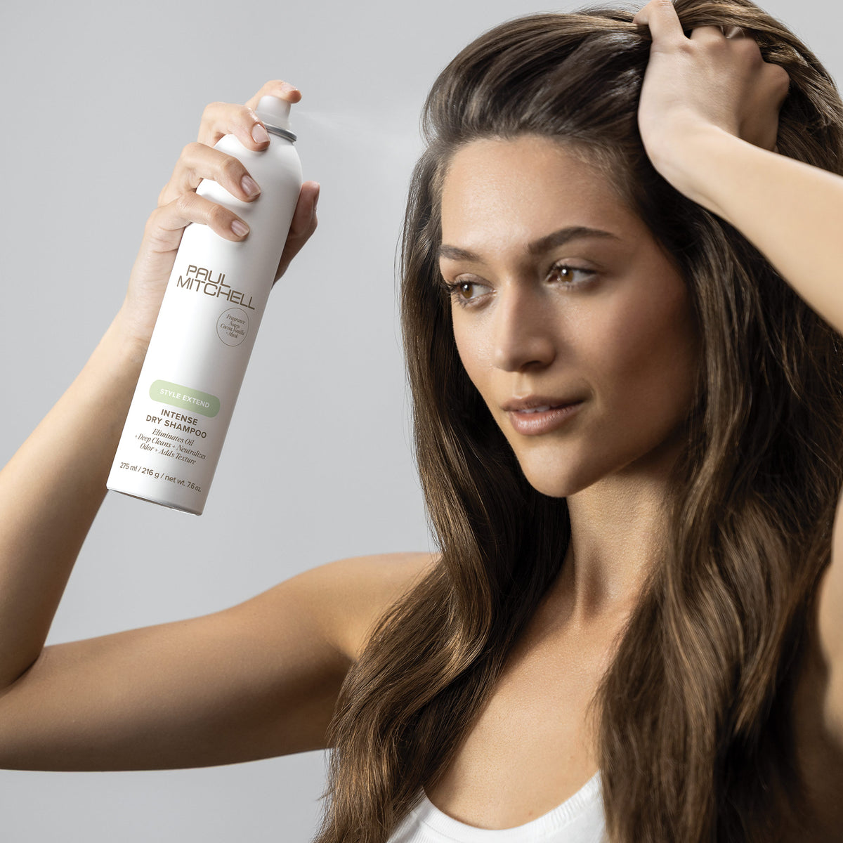 Paul Mitchell Intense Dry Shampoo 300ml – model holding product
