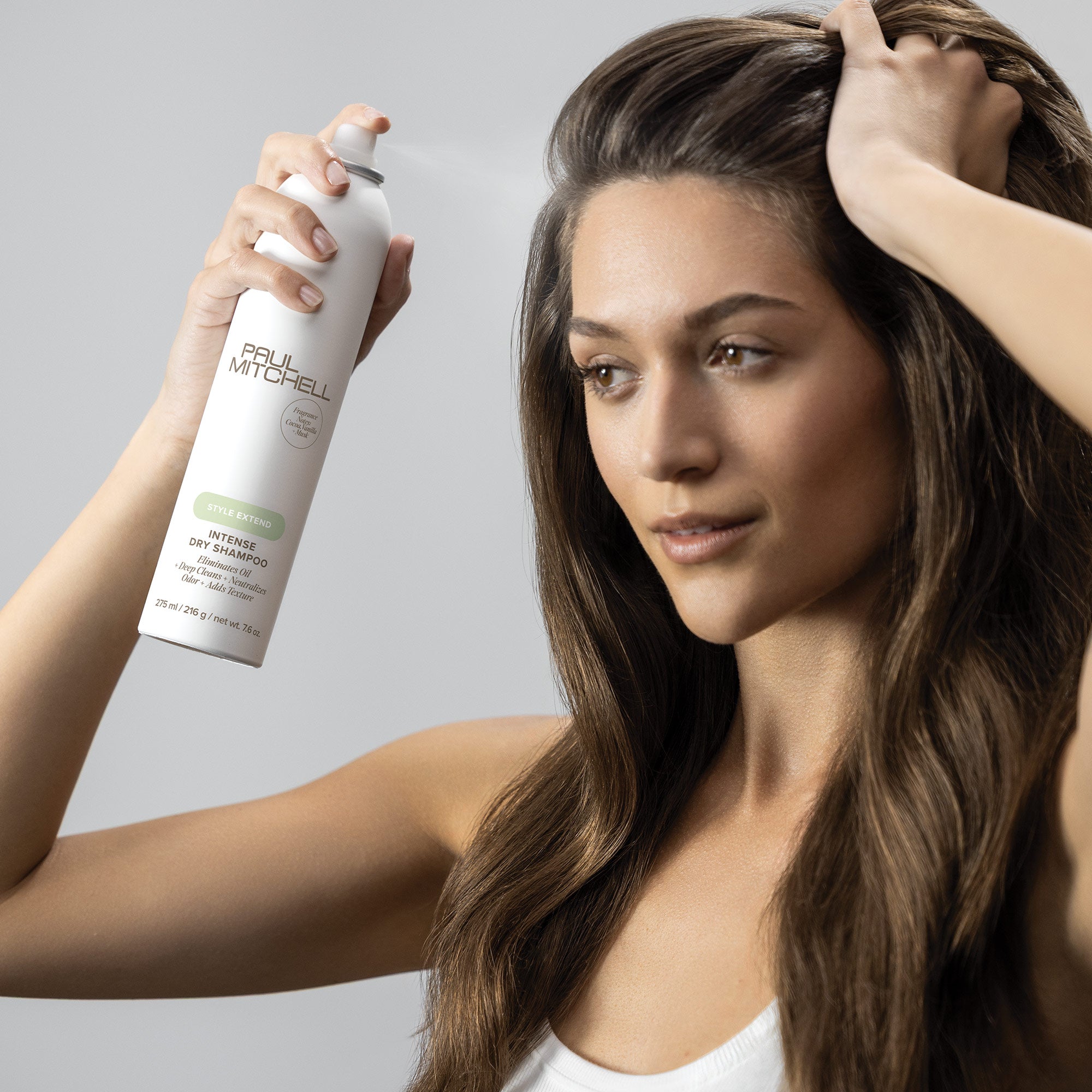 Paul Mitchell Intense Dry Shampoo 300ml – model holding product